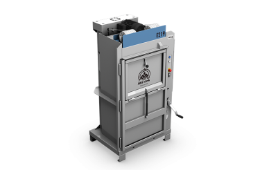 grey small baler on white background seen from the side
